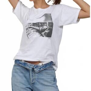 NEW CPRESS STUDIO relaxed mushie tee in close up on jeans